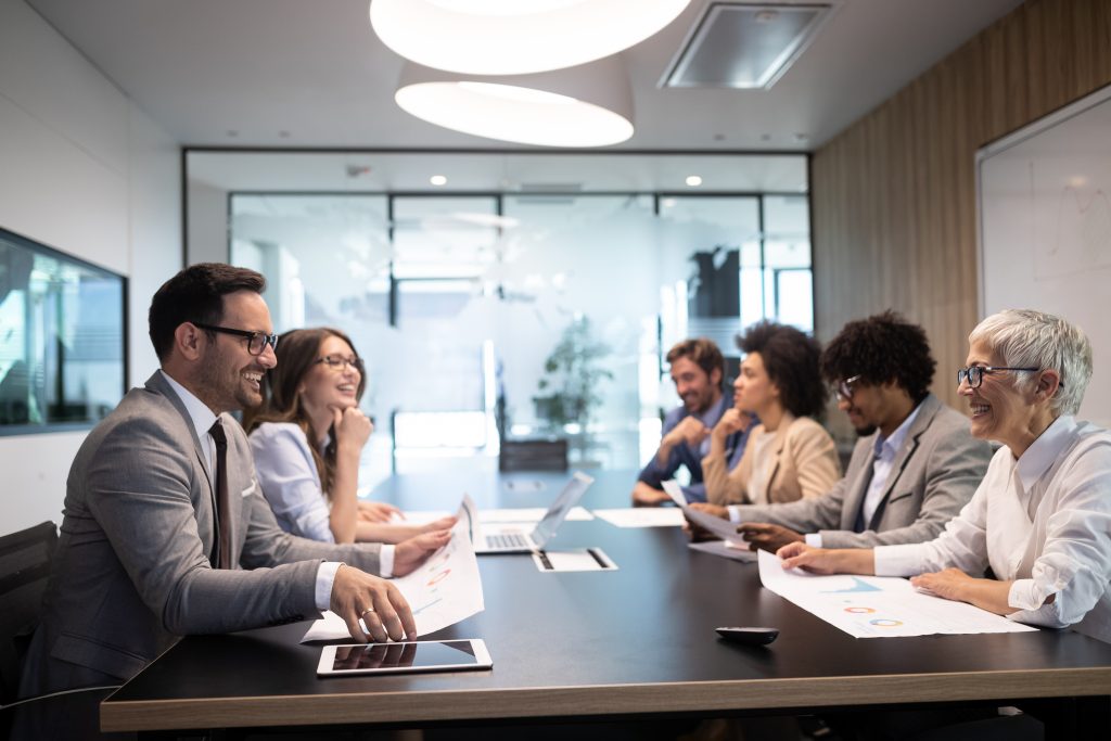Business colleagues having meeting in conference room in office