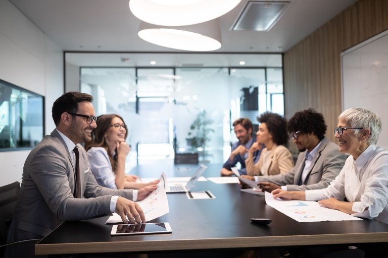 Business colleagues having meeting in conference room in office