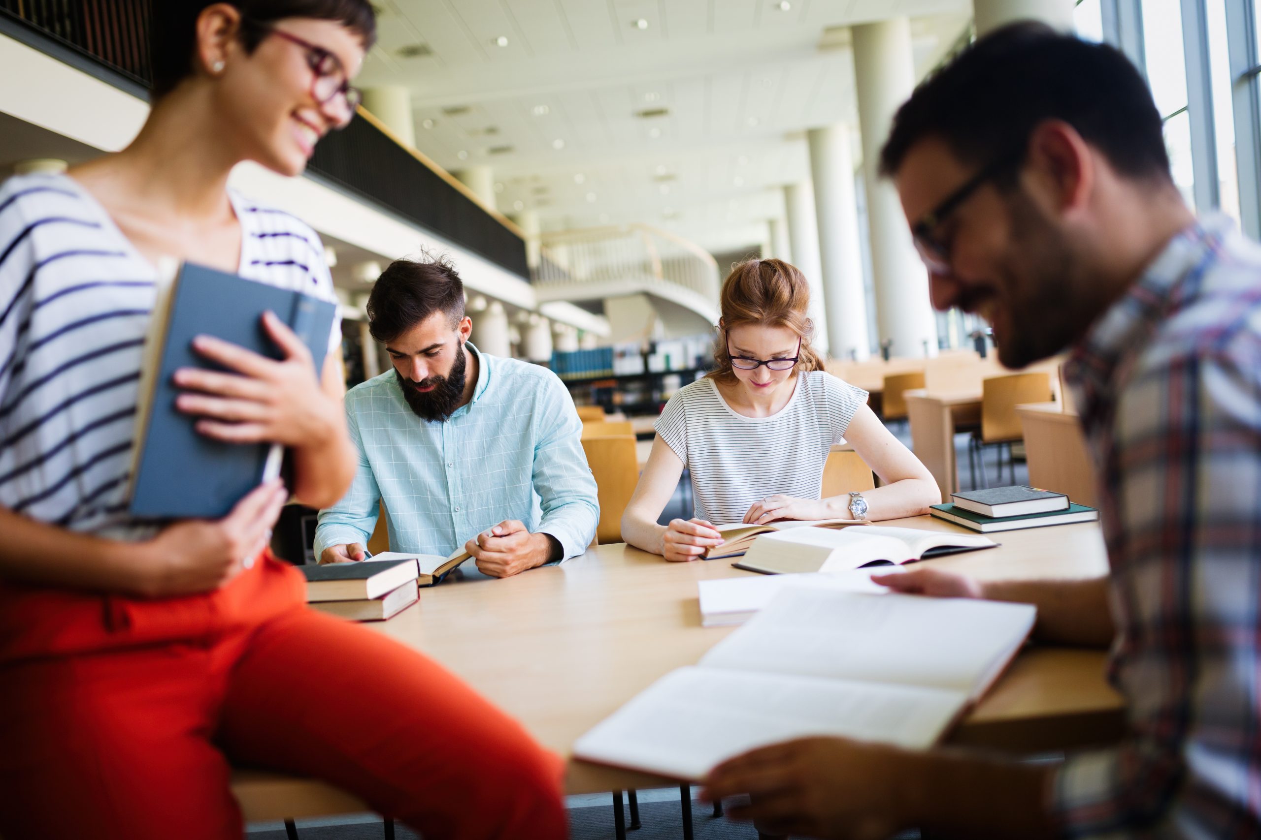 Group of college students studying